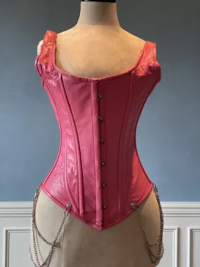 Salmon color leather corset vest with shoulder straps and chains. Steel-boned corset top for tight lacing.